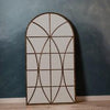 Arched Antique Gold and Black Metal Wall Mirror with Aged Gold and Black Overlay by Cooper Classics
